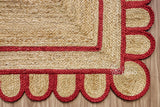 Red jute runner edge close-up highlighting scallop stitching