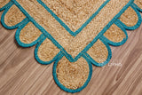 Overhead view of teal blue jute runner on wood flooring