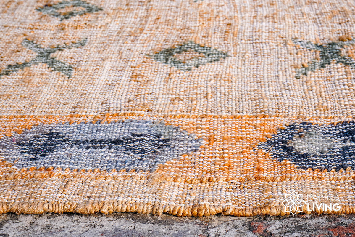 Handwoven Moroccan style rug shown in a bedroom setting