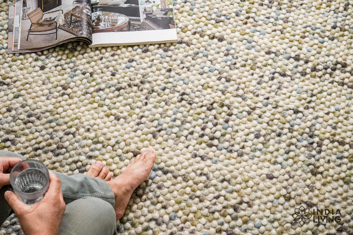 Pastel loop rug styled in a living room