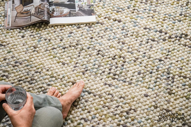 Pastel loop rug styled in a living room