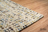 Chunky wool rug placed in a nursery
