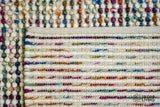 Colourful chunky wool rug in a cozy nursery setting