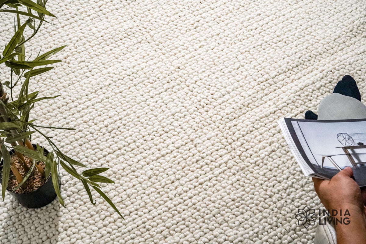 Ivory chunky looped wool rug flat view