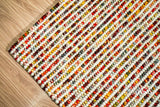 Chunky loop rug placed in a nursery