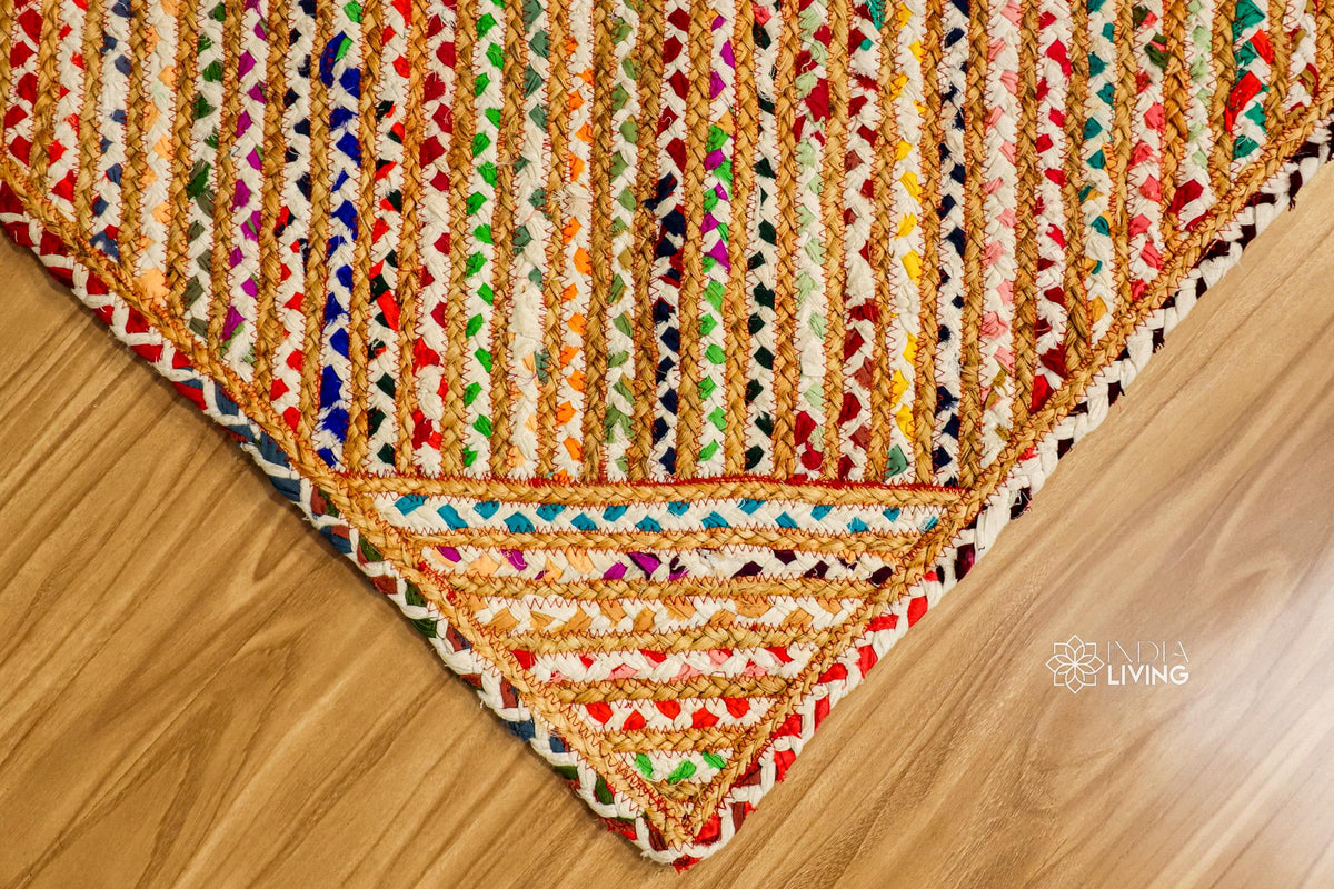 Hand braided rainbow rug in a modern boho living space