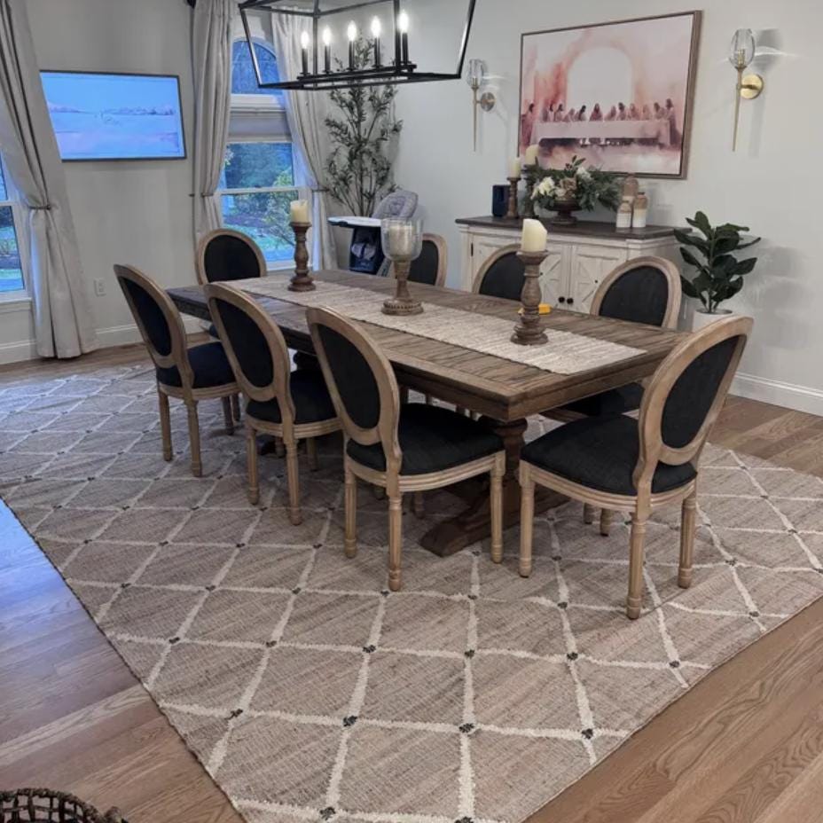 Jute rug styled with furniture in a living room
