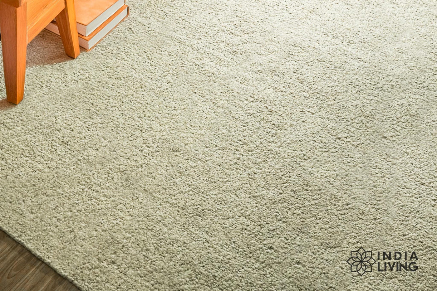 Light beige wool texture rug, flat lay view
