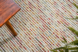 White wool rug corner detail showing edge
