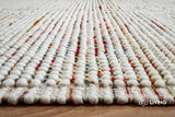 White wool rug pile texture close-up