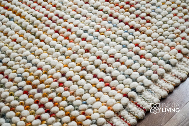 Rainbow blended chunky white wool rug flat view