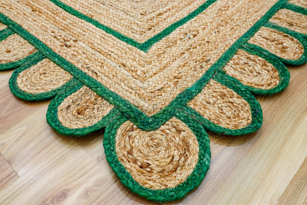 Green scallop hand braided jute rug, full flat view