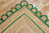Green jute rug corner detail showing braided texture
