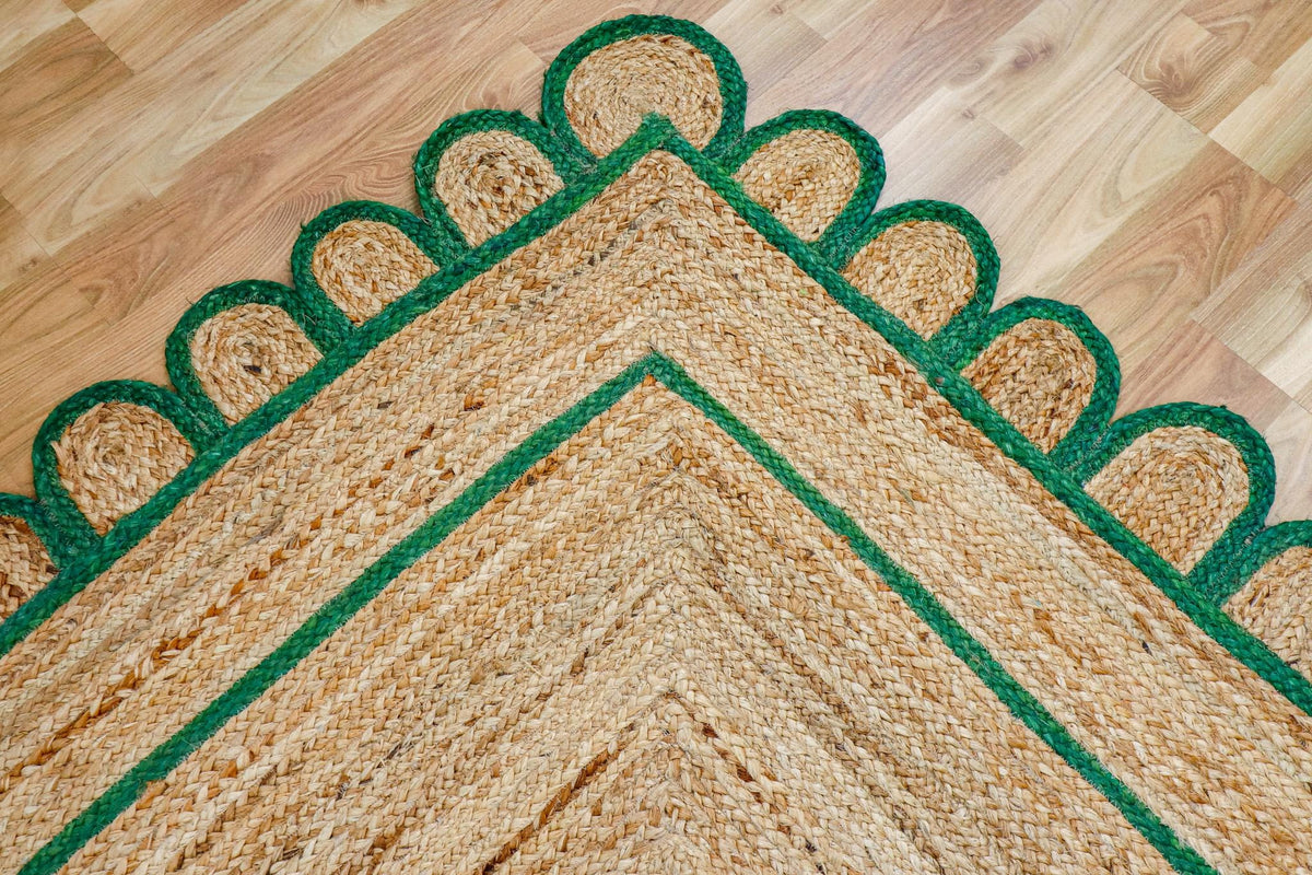 Green jute rug corner detail showing braided texture