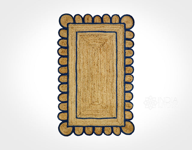 Navy blue scallop jute runner styled in a hallway