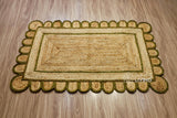 Olive green scalloped jute rug texture detail shot