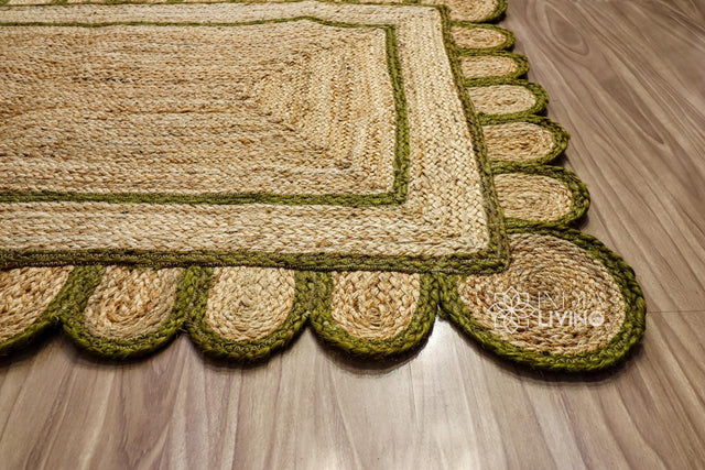 Olive green scalloped hand braided jute rug, full flat view