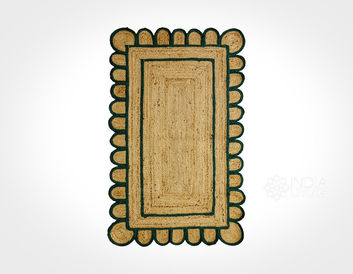 Dark green jute rug corner detail showing braided texture