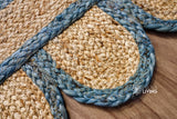 Aqua blue scalloped rug styled with coastal decor