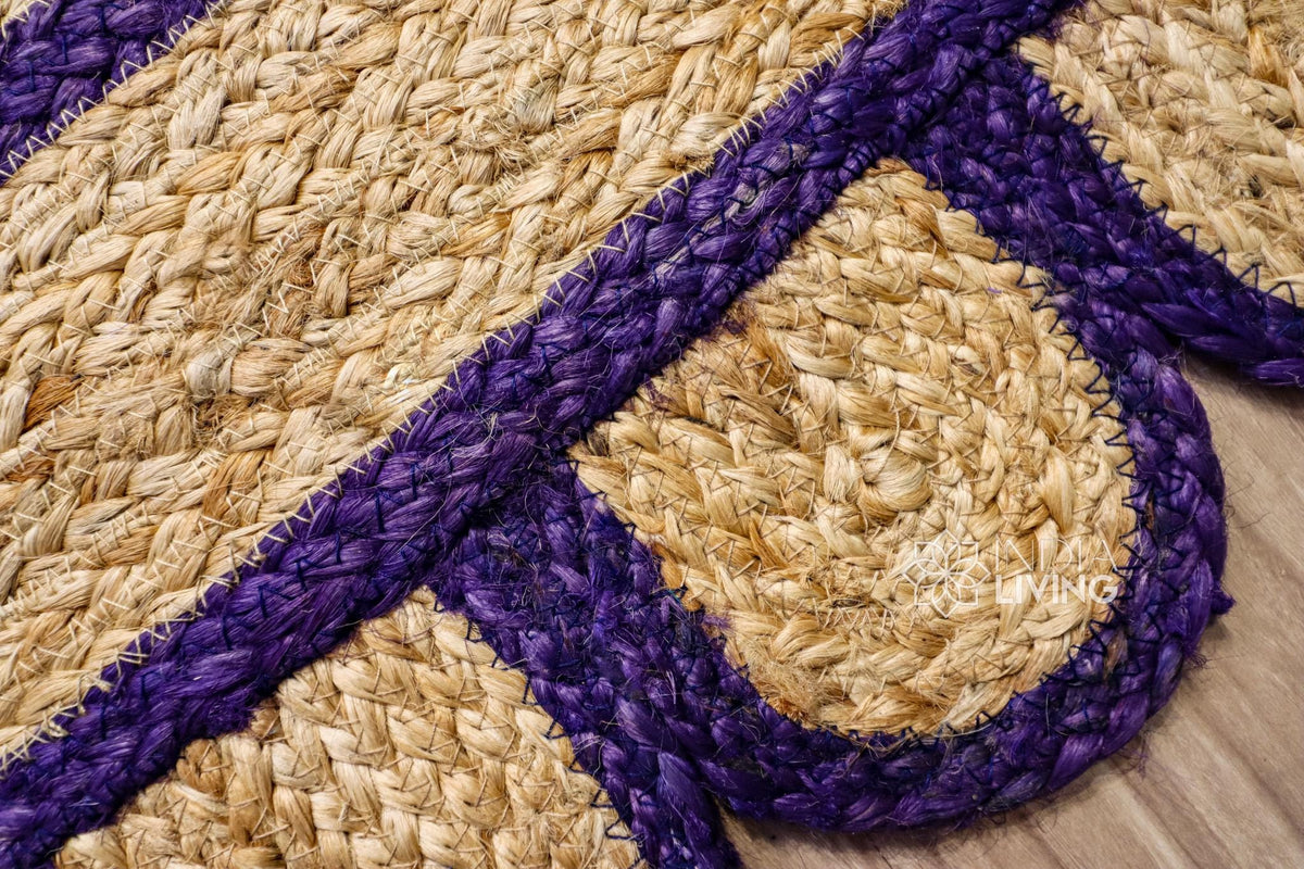 Purple jute runner in an entryway styled with décor
