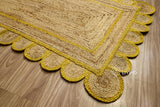Corner view of yellow jute runner showing braided weave