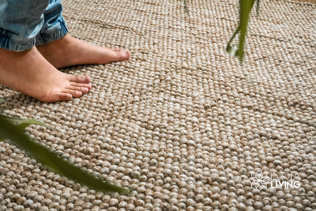 Natural beige chunky wool rug laid flat, full bubble texture view