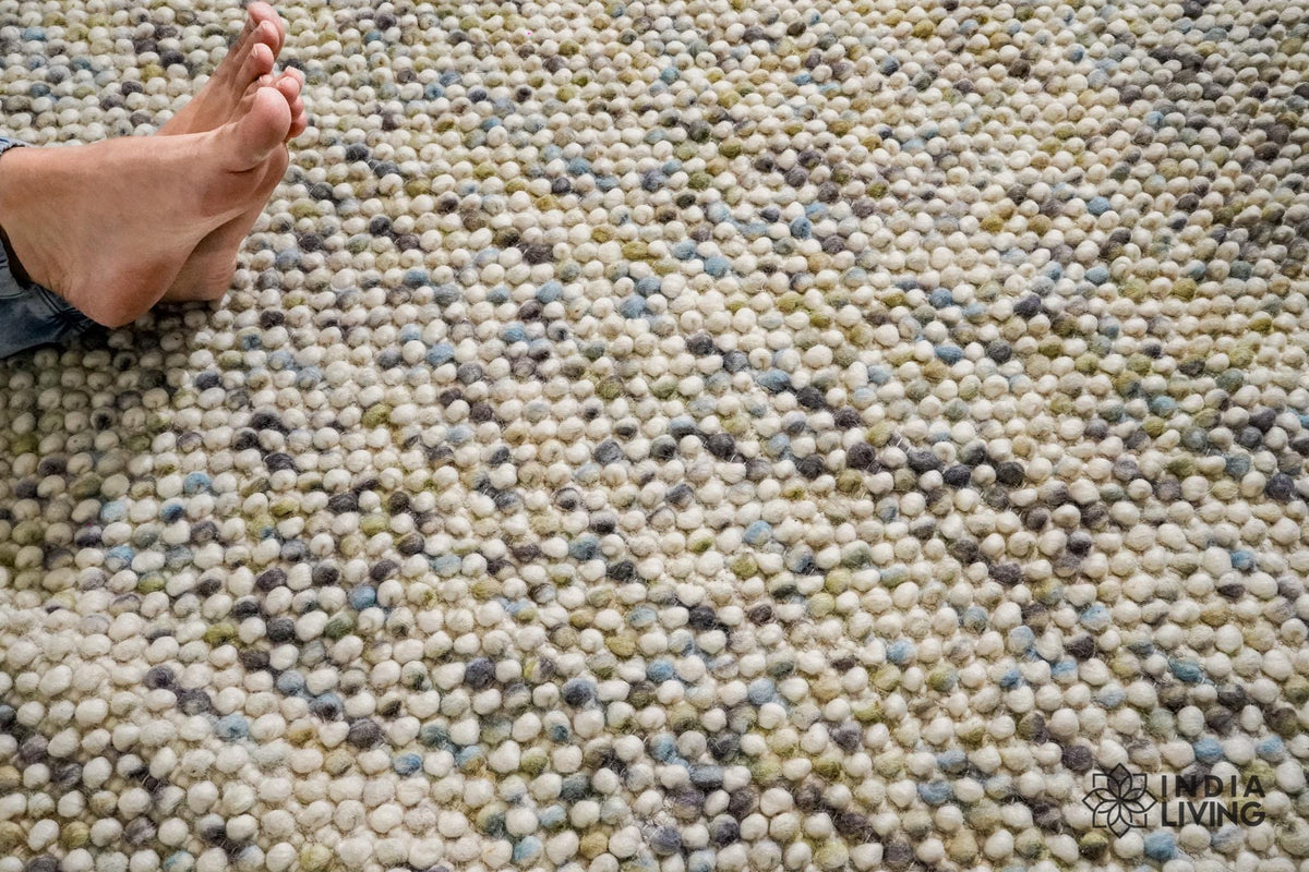 Pastel wool rug in a bright bedroom setting