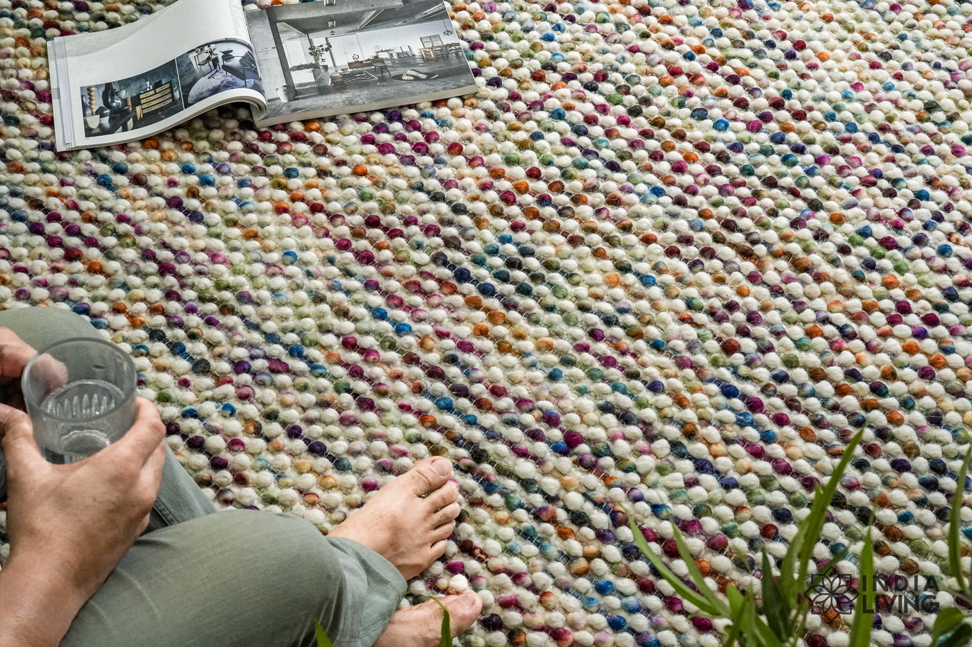 Colourful chunky wool loop rug handwoven in multicolour, full flat view