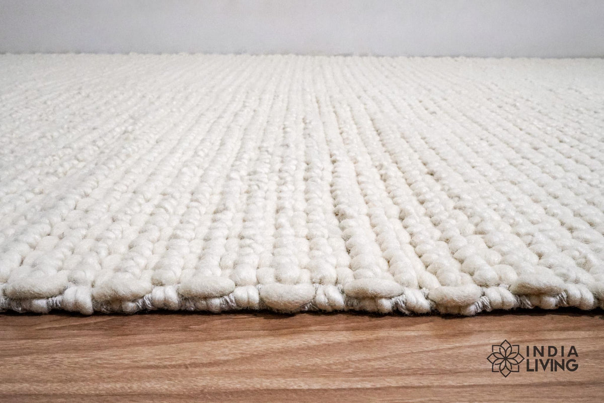 Ivory chunky rug full flat lay top view