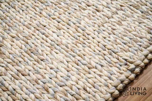 Taupe grey chunky wool rug styled in a living room