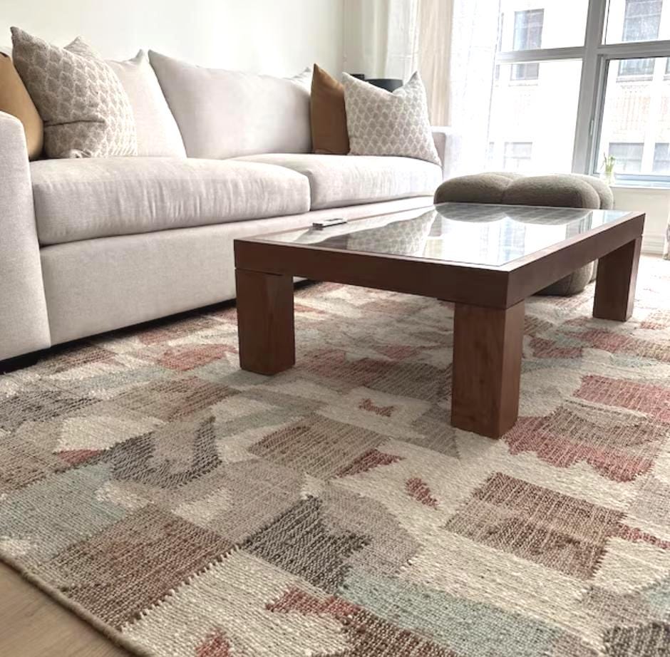 Colourful jute rug styled in a living room