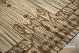 Beige kilim rug styled in a living room