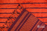 Red kilim rug styled in a living room setting