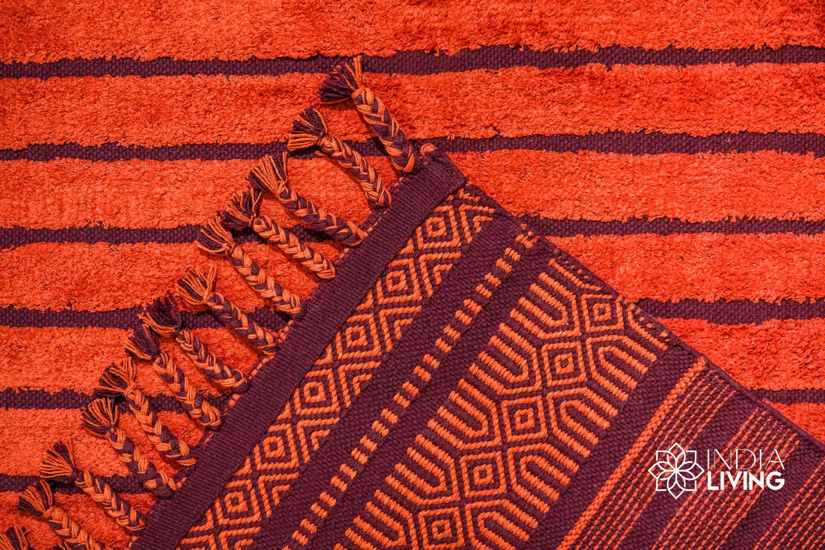 Red kilim rug styled in a living room setting