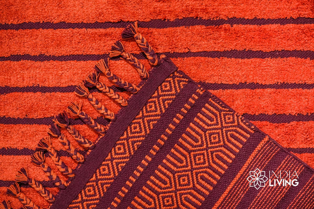 Red kilim rug styled in a living room setting