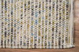 Pastel rug styled with playful kids room decor