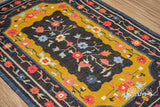 Wool area rug in bedroom setting