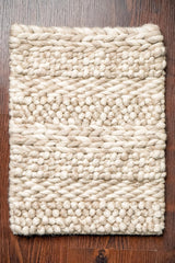 Multi patterned chunky wool rug, flat lay view