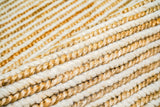 Natural ivory wool jute rug corner detail