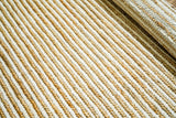 Wool jute braid rug styled in a Scandinavian living room