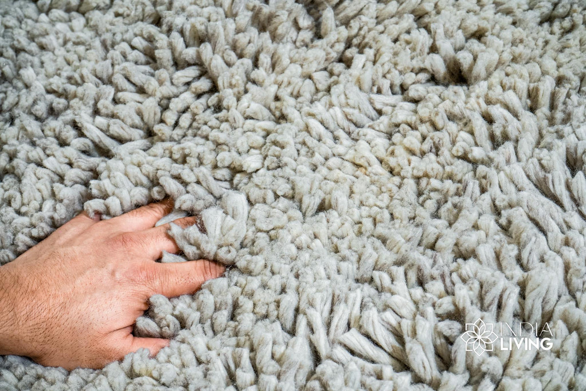 Taupe grey wool shag rug laid flat, full lush texture view