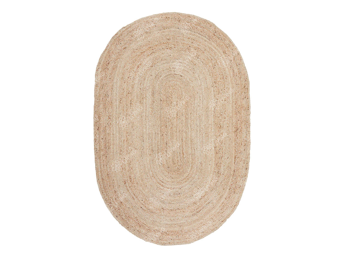 Full view of white oval jute rug on floor