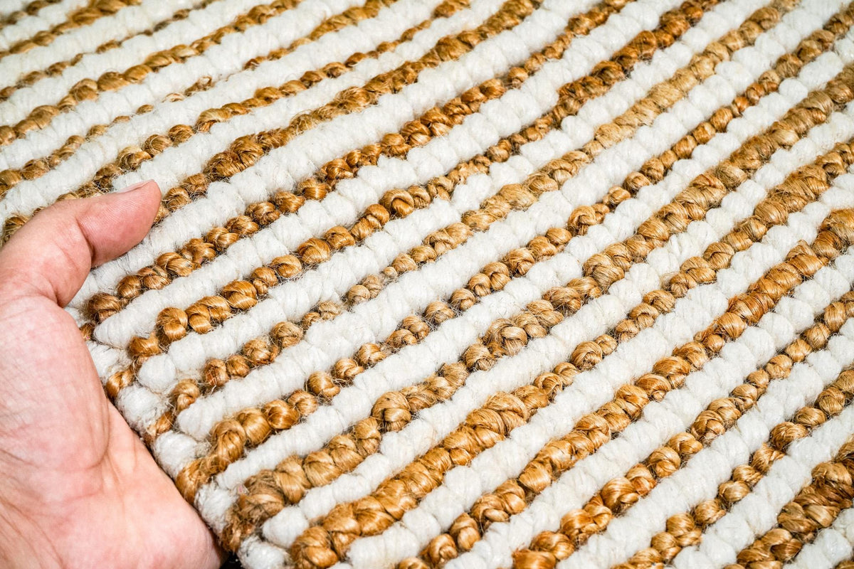 Detail shot of wool and jute fiber blend in ivory tone