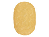 White oval jute rug in natural light