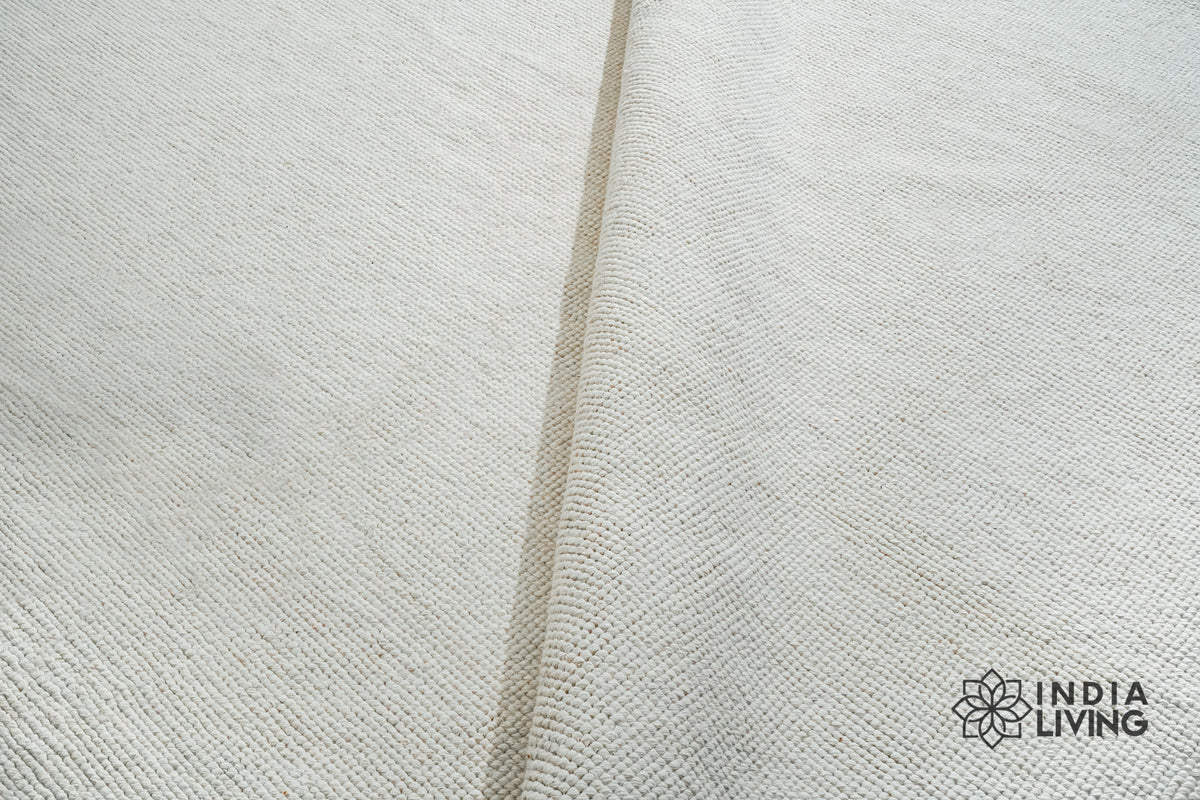 Ivory rug texture detail under natural light