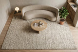 Cashew Loop — Wool rug styled in a living room