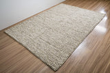 Cashew Loop wool rug — full view of the rug shown on the floor