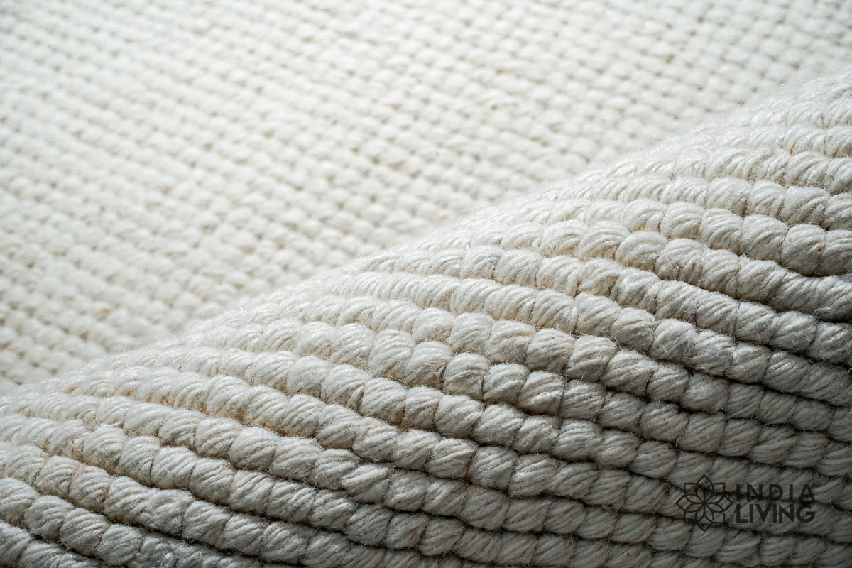 Handwoven wool rug in a nursery setting