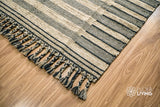 Wool rug texture close-up under natural light