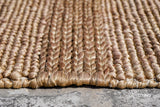 Natural beige jute rug in a dining room setting